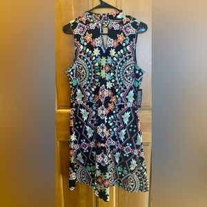 Brand new with tags sleeveless dress multi colors with black back ground.